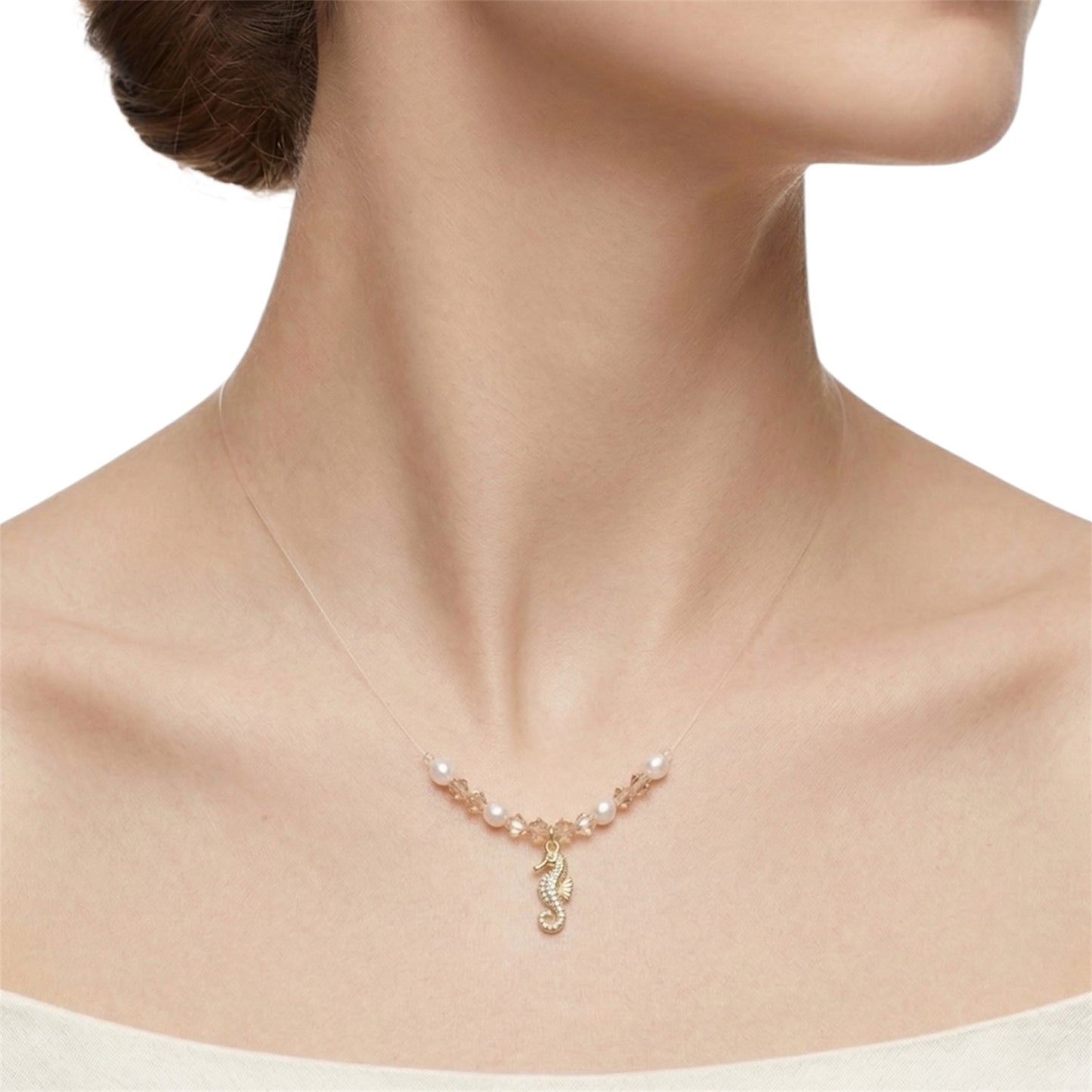 Collar Invisible con Caballo de Mar Bañado en oro 18k